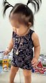 Little girl adorably dances to some techno beats