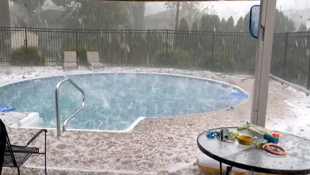 Hail hammers part of Iowa as storms rumble through the Midwest