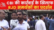 RJD supporters protest against CBI raid in Patna