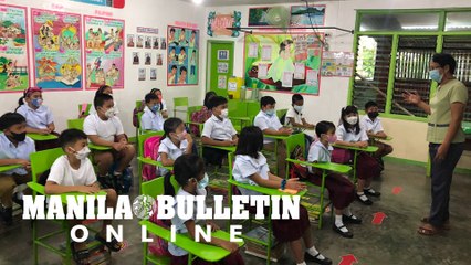 Grade 3 pupils of Rita Lovino Elementary School in Negros Occidental attend first day of face-to-face classes
