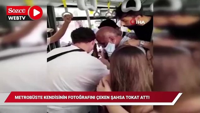 Metrobüste kendisinin fotoğrafını çeken şahsa tokat attı