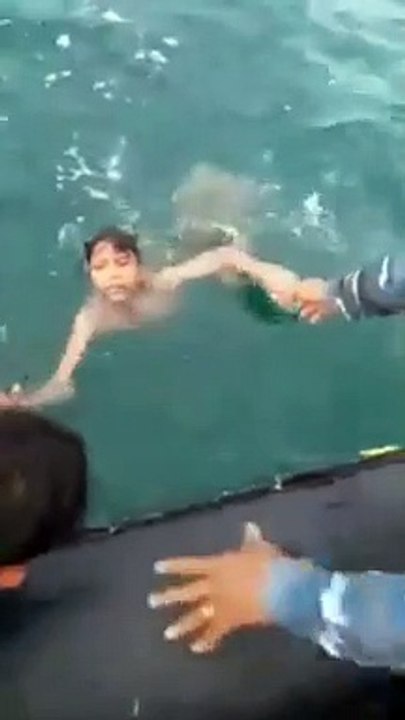 A Child Stranded In The Sea