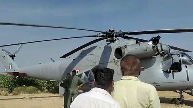 Villagers baffled after seeing army helicopter landed in the field, emergency landing due to fault