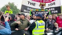 Manchester United supporters scuffle with police during protest against club's ownership
