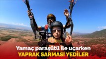 Yamaç paraşütü ile uçarken yaprak sarması yediler