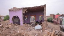 Homes damaged by flooding from Nile River