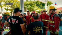 Bomberos de Veracruz realizan partido de basquetbol con todo y sus trajes