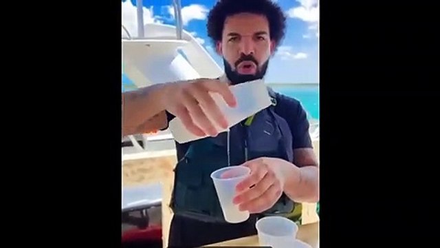 Drake serves as bartender on vacation at Turks and Caicos