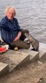 Kind Man Feeds Nutria Potatoes and Watermelon