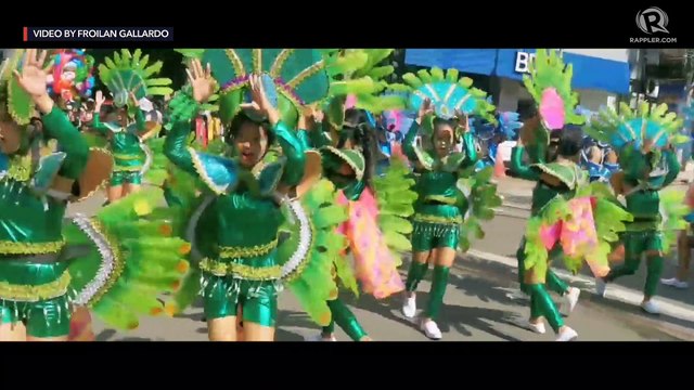 Street dancers perform at the Higalaay Festival street dancing parade