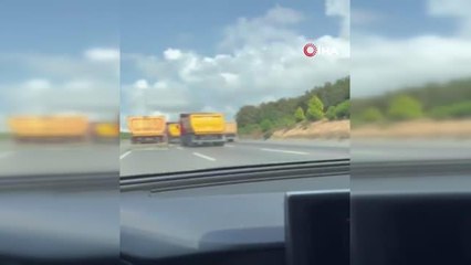 Hafriyat kamyonları tehlike saçıyor... 3 şeritli otoyolu kapatan kamyonlar adeta birbirleriyle yarıştı
