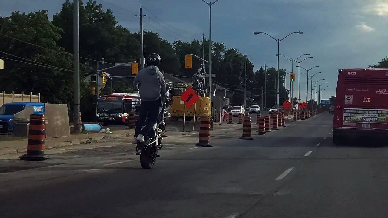 Brave Biker Doing Stupid Stunts