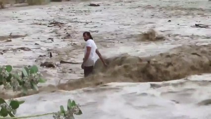Floods swept him and his car away