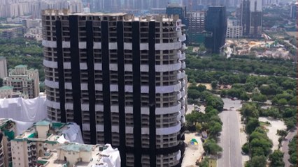 Twin Tower Demolition : Children, elderly advised to wear masks | Abp news