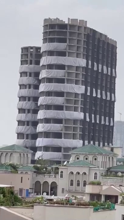 Live view: Simble of the corruption (Twin Towers buildings) being grounded in Noida...