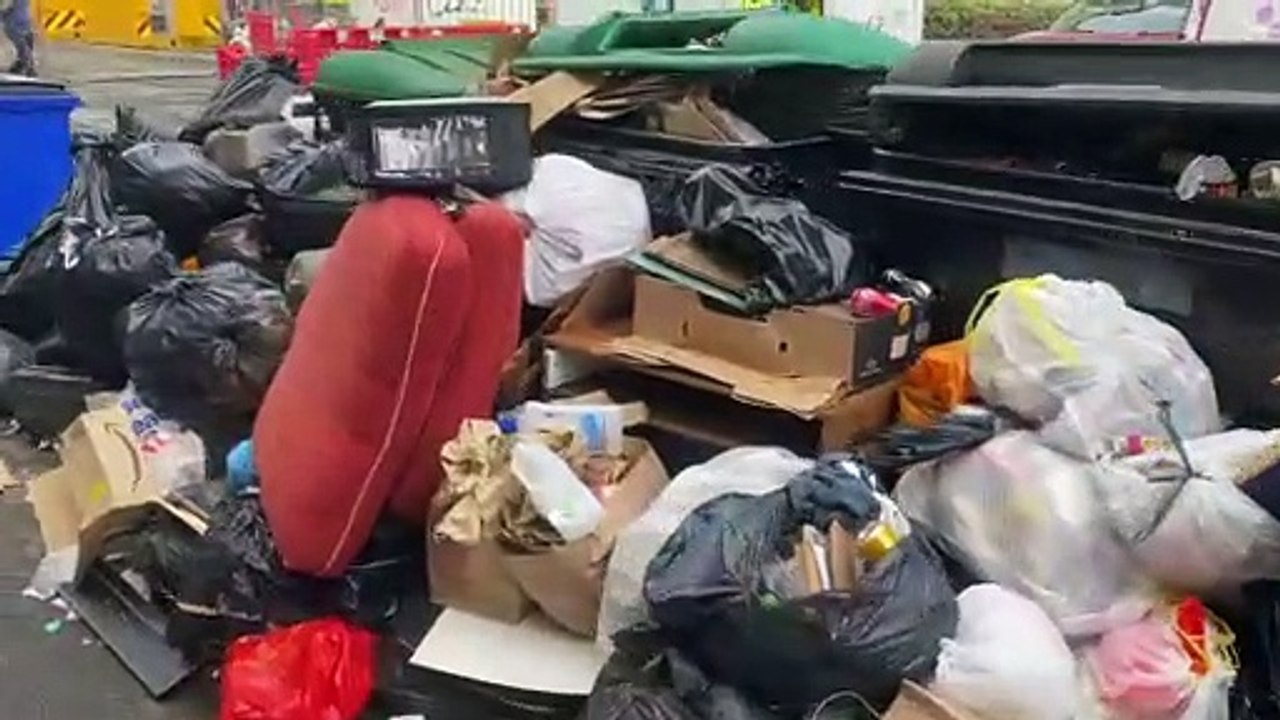 Shocking video footage shows a massive rubbish pile – thought to stretch nearly 100ft down a street in Edinburgh