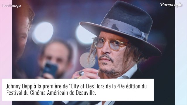 Johnny Depp se moque ouvertement d'Amber Heard lors de son apparition surprise aux MTV VMAs