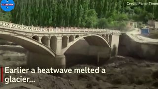 Pakistan: Bridge crumbles after heatwave triggers floodsClose