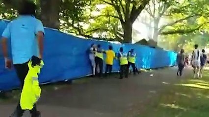 Footage shows fight breaking out at Victorious Festival with volunteer having man in armlock