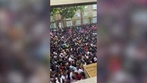 Notting Hill Carnival crowds seen screaming and forced to climb over gates as thousands packed into one road with no space