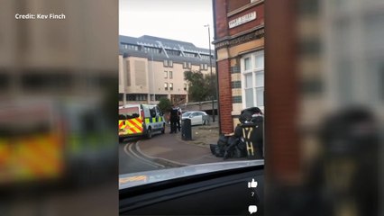 Parking warden rows with police officer