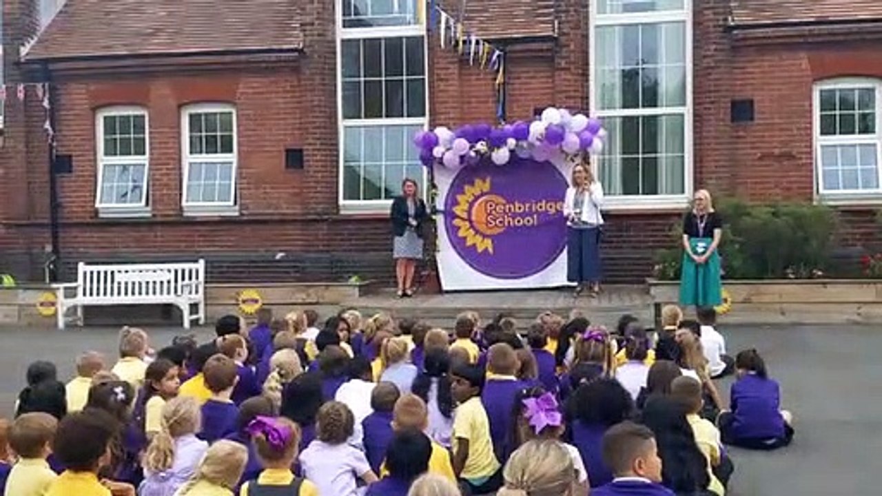 Councillor Suzy Horton cuts the ribbon at Penbridge Infant and Nursery as the school celebrates its merge with Penbridge Junior School