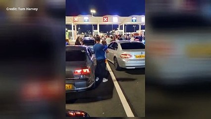 Tensions flare between people queuing to get back to the UK