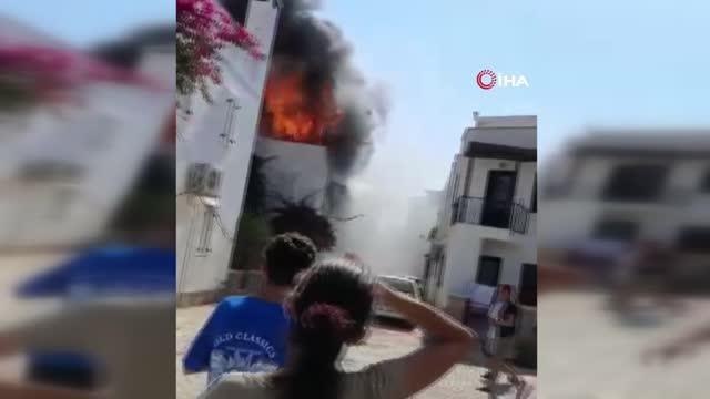 Alevlerin arasında kalan kadın, ikinci kattan aşağı atladı