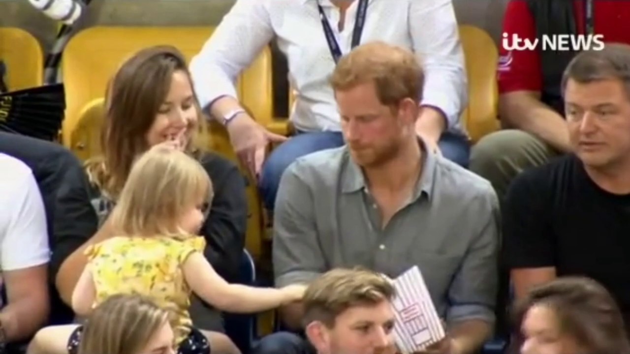 lucky little girl can eat prince HARRY popcorn