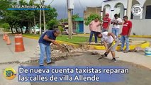 De nueva cuenta taxistas reparan las calles de villa Allende