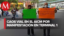 Ex trabajadores de Mexicana de Aviación retiran bloqueo en Terminal 1 del AICM