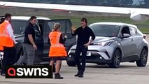 Tom Cruise was seen shaking hands with staff at a small British airport