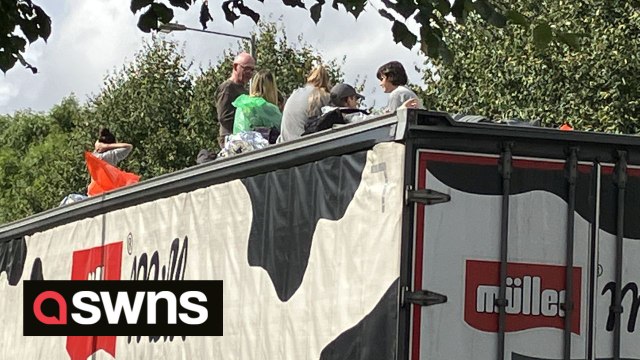 Animal Rebellion protesters spark chaos by supergluing themselves to lorries at Muller dairy