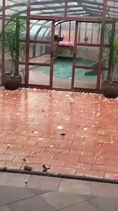 Hail Damages Covered Pool