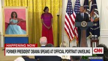 Barack Obama gives a speech after the unveiling of his White House portrait