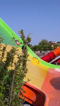 Guy Wipes Out on Innertube Slide