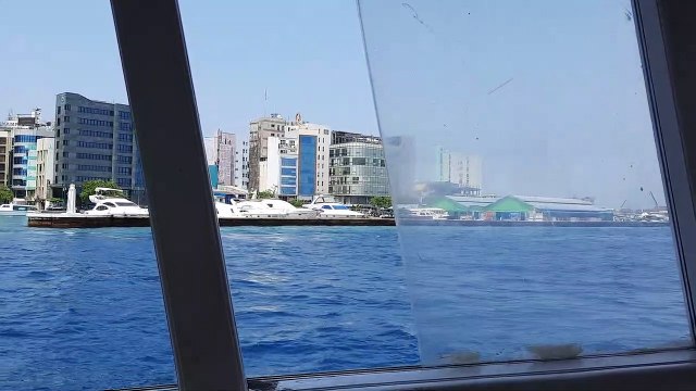 Passenger boats are the main means of travel in the crystal clear waters of the Maldives