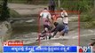 Bike Riders Rescued From Being Swept Away By Overflowing Water | Public TV