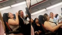 Excited girl lets out a victory cry when plane finally takes off following massive delays