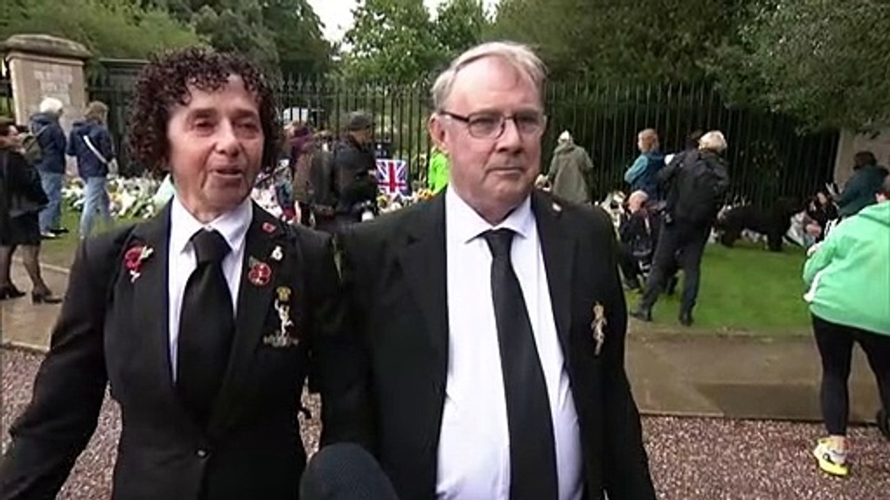 People gather at Windsor Castle to lay flowers