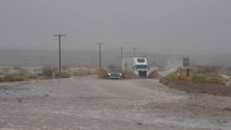 Floodwaters from Tropical Storm Kay course through Southern California