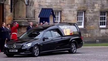 The Queen's cortege arrives at Edinburgh's Palace of Holyroodhouse