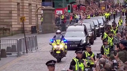 Thousands welcome Her Majesty's cortege as it arrives in Edinburgh