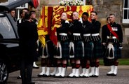 Queen Elizabeth’s grieving children watched her coffin arrive in Edinburgh