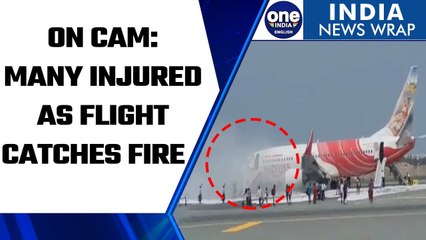 Tải video: Air India Express plane catches fire: Smoke emerges, passengers injured at Muscat|Oneindia News*News