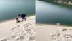 'Fun-filled footage of girl going down a WAY TOO HIGH sand dune and ending up in river'