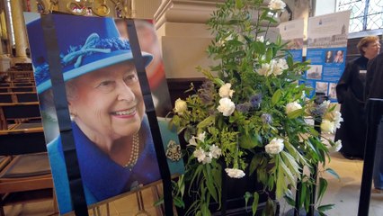 Mourners gather at St. Philip’s Cathedral to express condolences for the Queen