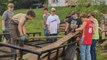Youth Football Team Rebuilds Bridge Destroyed By Flooding