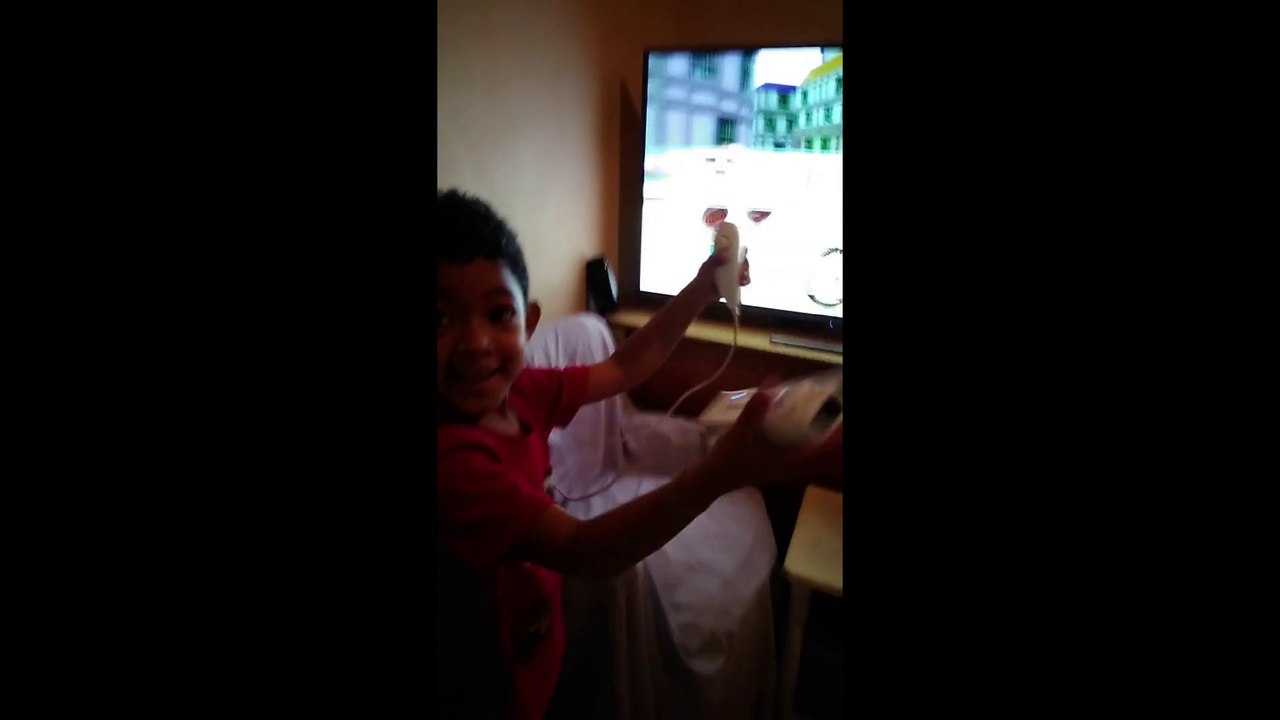 Nephew doing cycling on Wii Sports Resort for the Nintendo Wii - Part 2