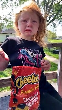 Grimacing Girl Says She Likes Spicy Cheetos